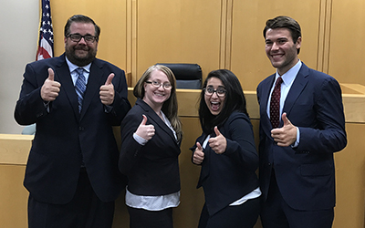 (L to R) James Sullivan and Sarah Lowe defeated Priscilla Shaikh and Ted Hammers in the AAJ Moot Court Competition. All of the students are in their third year at Willamette Law.