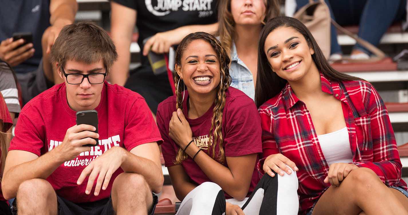 cheering on Willamette football team