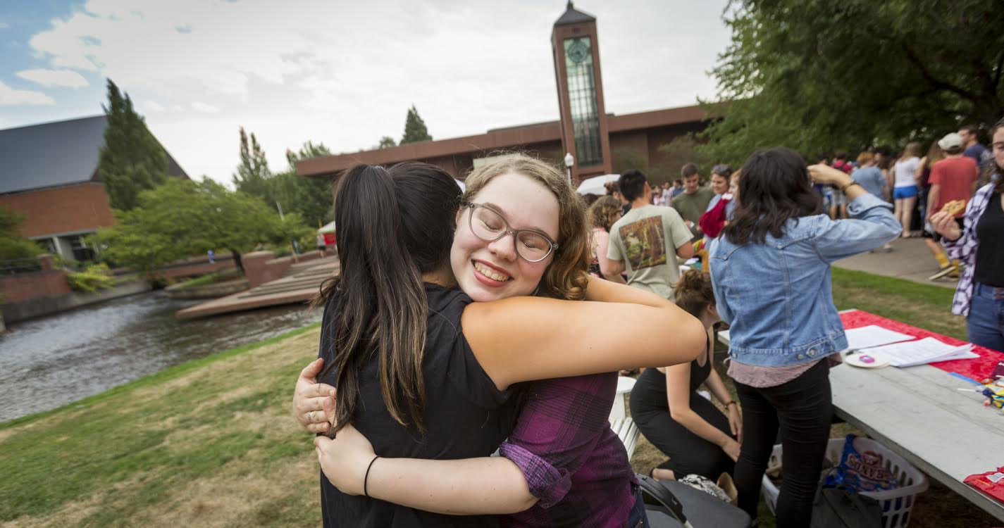 Activities and Resources Expo friends hugging