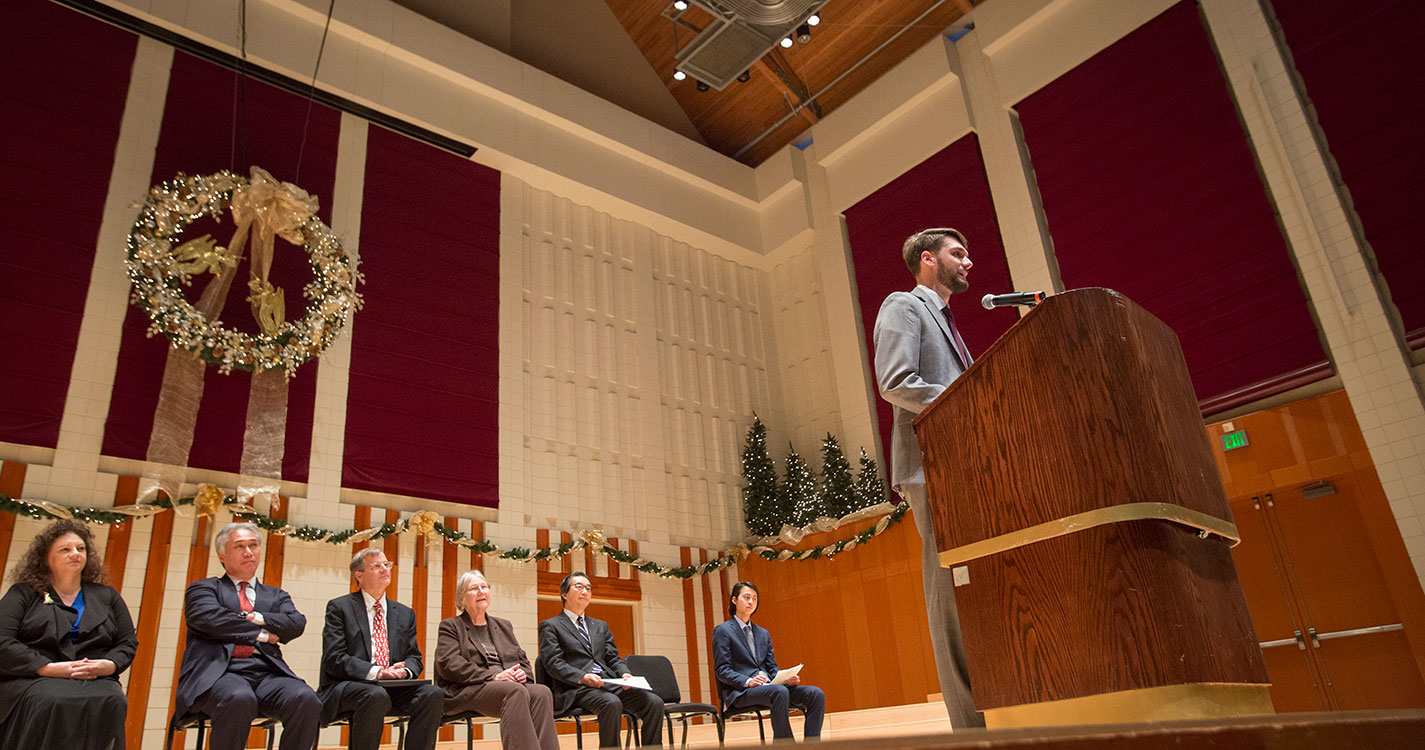 ASWU President Jack Wellman speaks at the closing ceremony for the American Studies Program on Friday in Hudson Hall. 