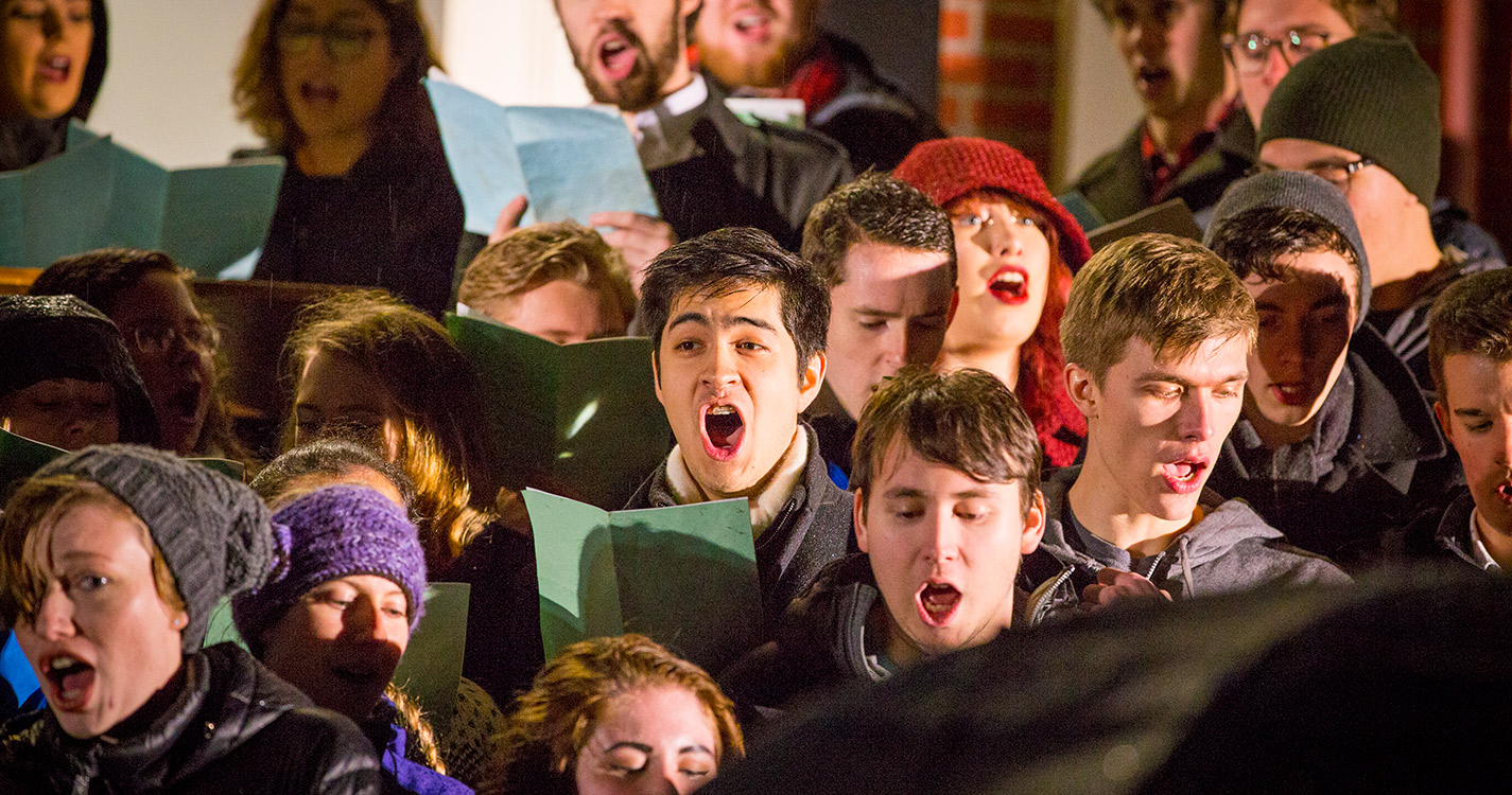 Choir singing on steps of Waller Hall