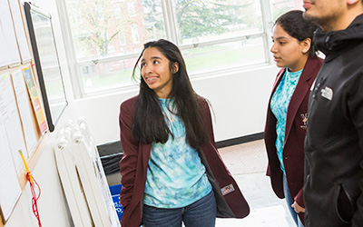 Willamette Academy student provides a tour of the new academy facilities at the open house