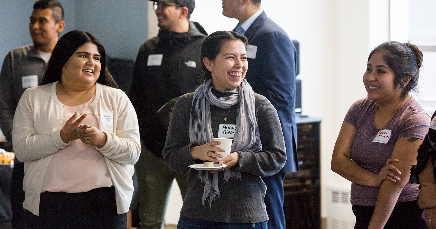 People visit at the Willamette Academy open house celebrating the academy’s move to its new location in Fine Arts West.