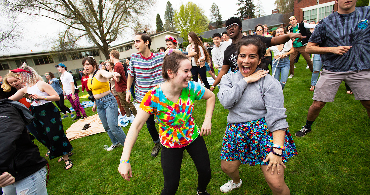 Students do "jazzercise" on Brown Field at Wulapalooza.