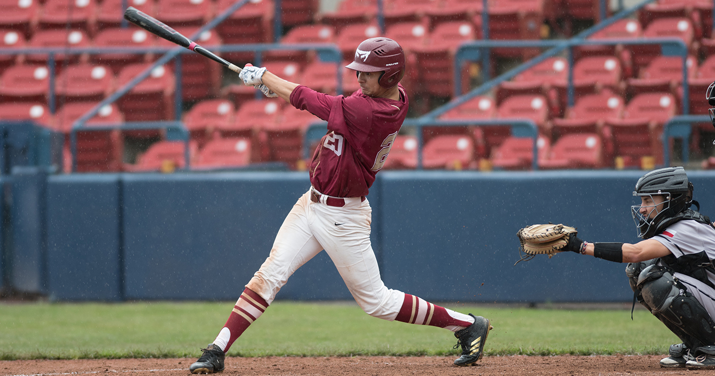 Perry Van Ekhardt ’18 hits a home run in the ninth inning of the