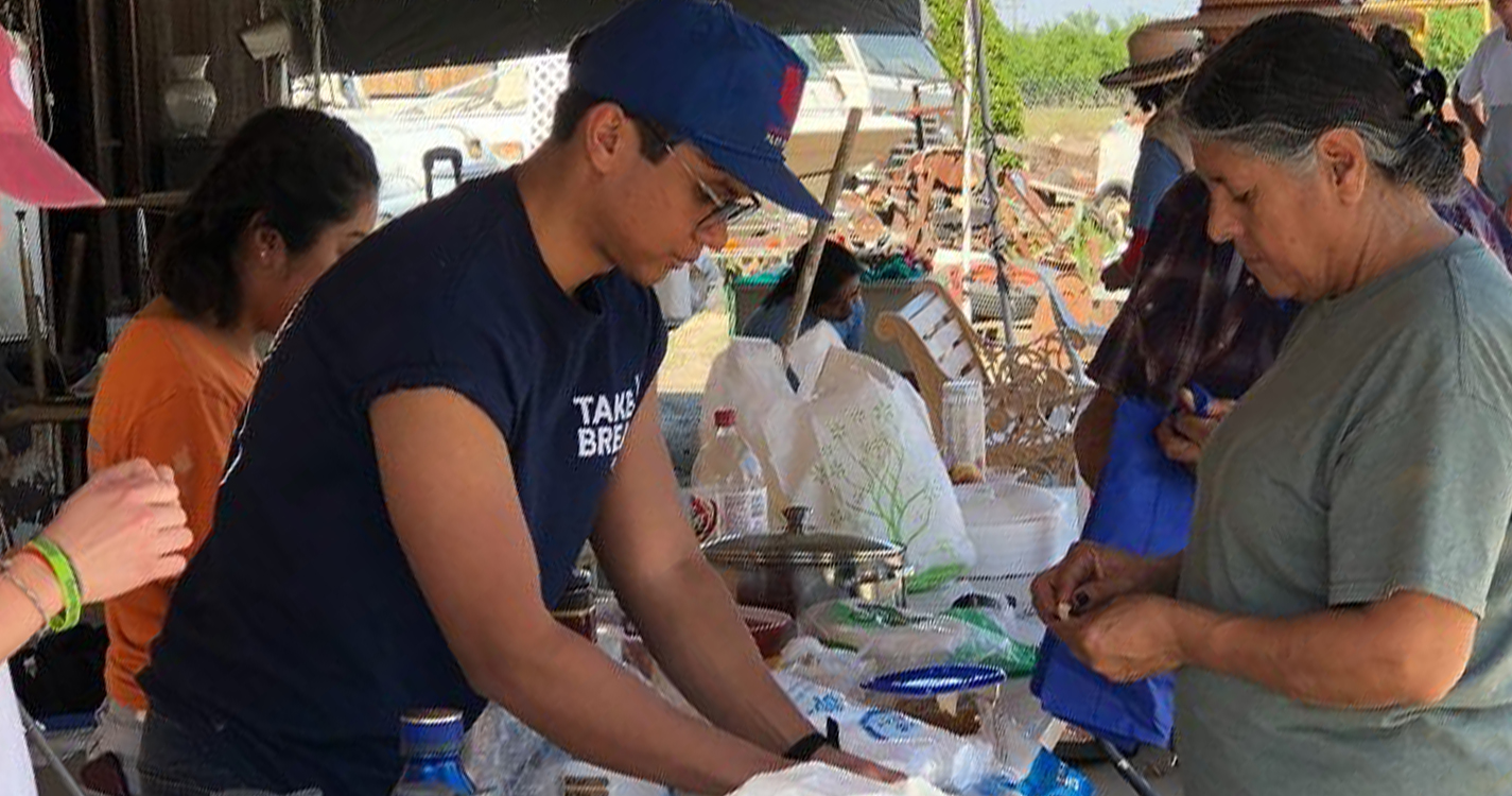 Student works on a food line near Fresno.