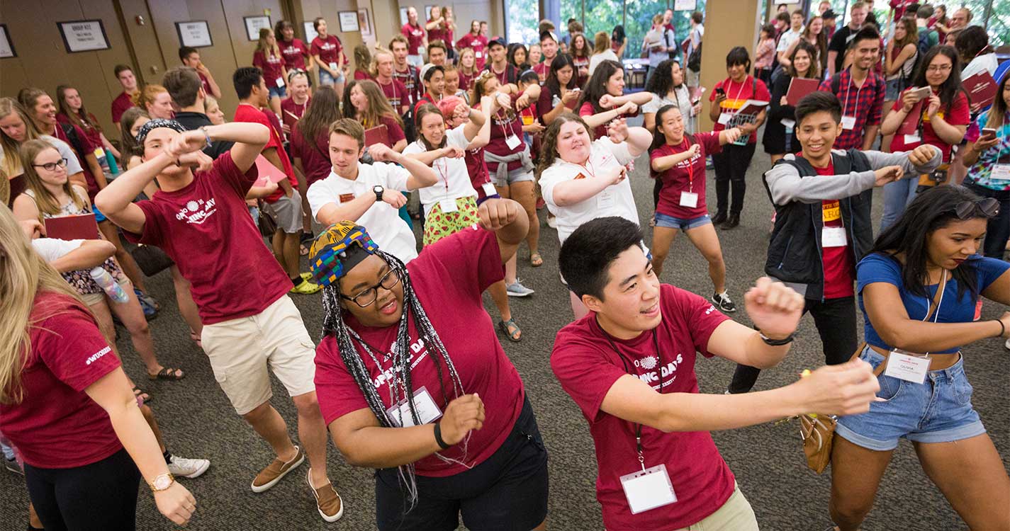 Members of the Opening Days team dance.