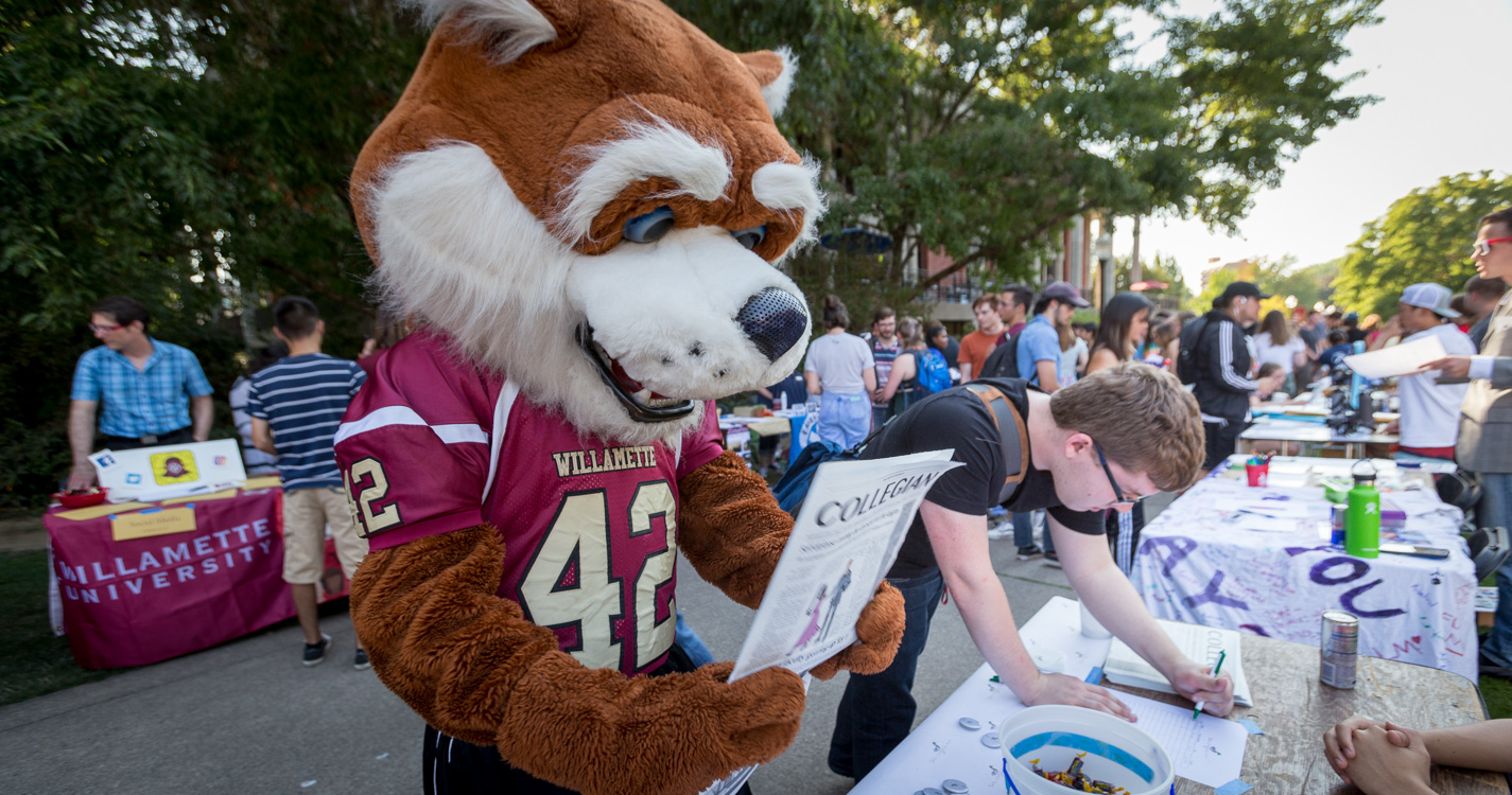 Blitz the Bearcat reads a Collegian