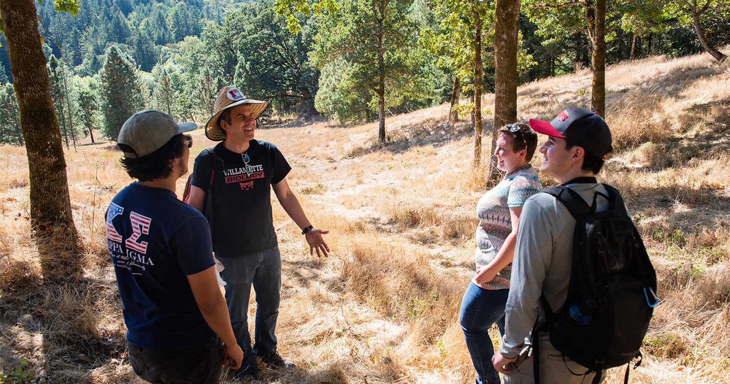 Professor David Craig talks to a small group of visitors