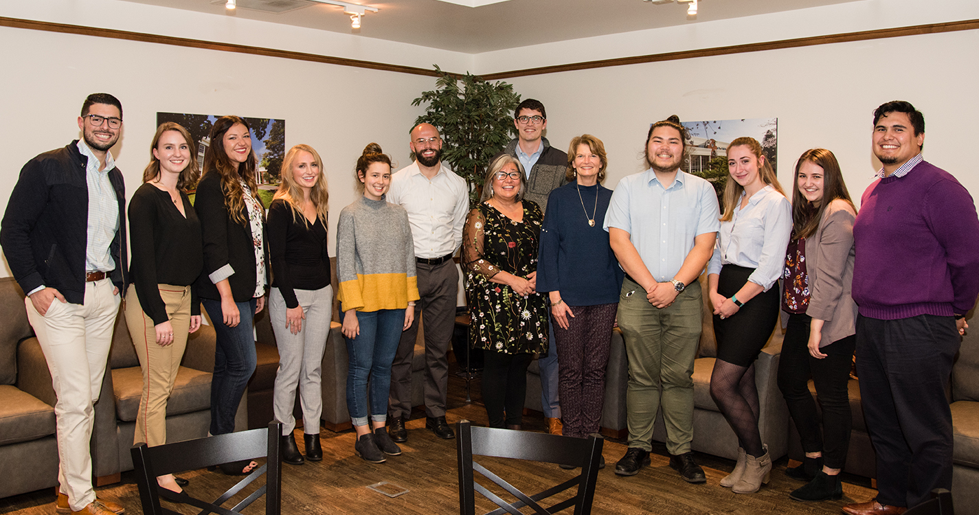 Sen. Lisa Murkowski stands with a group of Willamette students from Alaska.