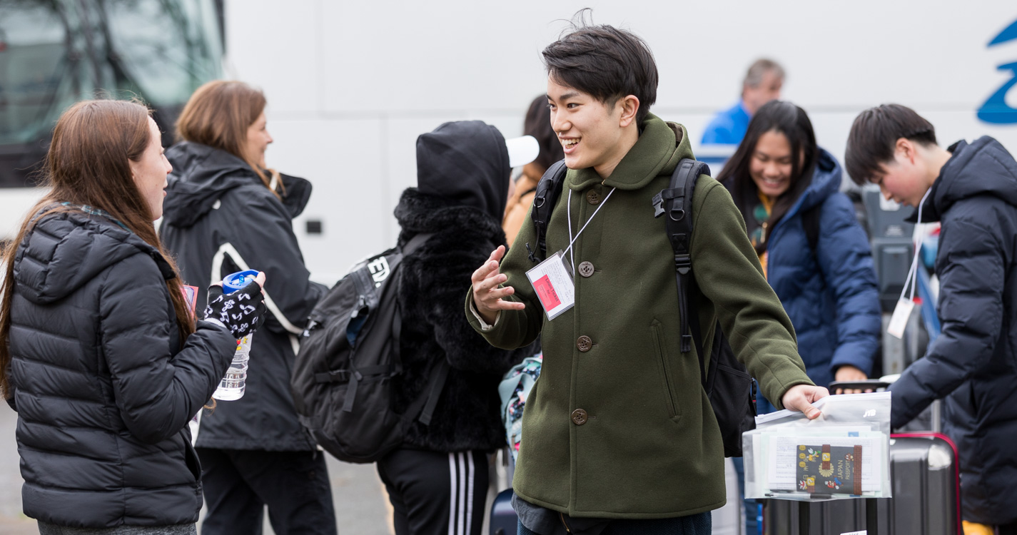 Willamette student greets a new ASP student