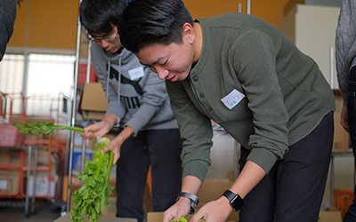 Students pack food for Global Day of Service