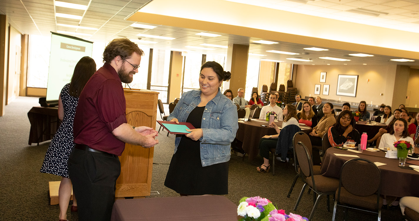 Adrianna Nicolay receiving the Professional Development award