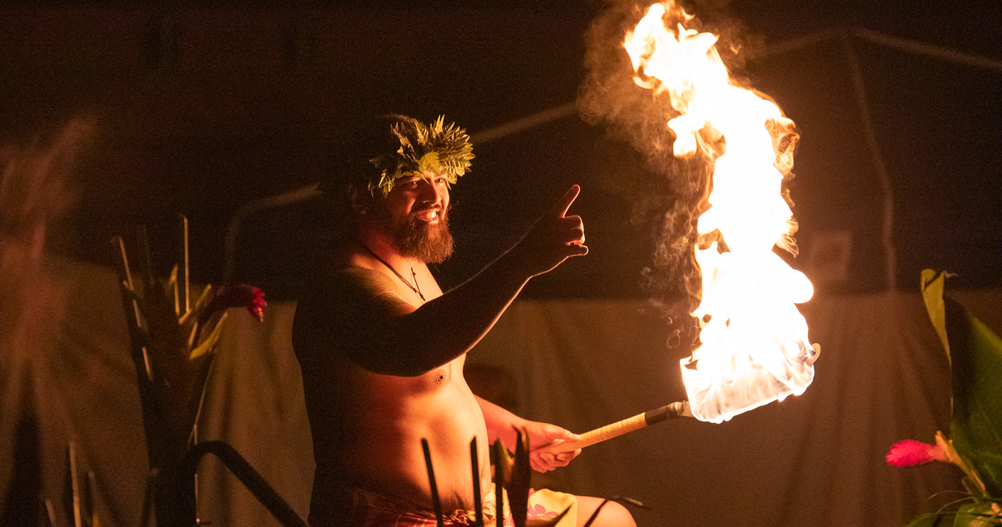 Tolo Tuitele with a flaming baton