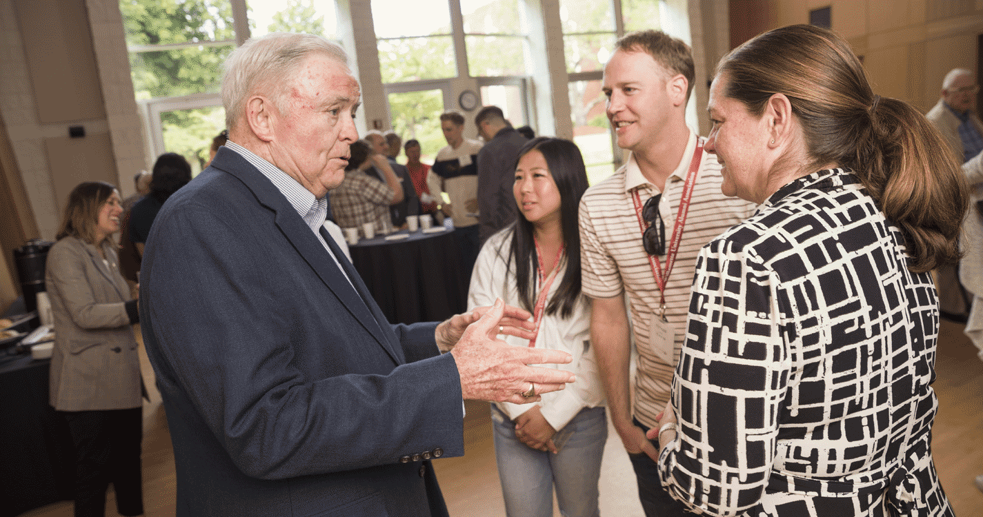 Alumni chat at the Greek Life Reception