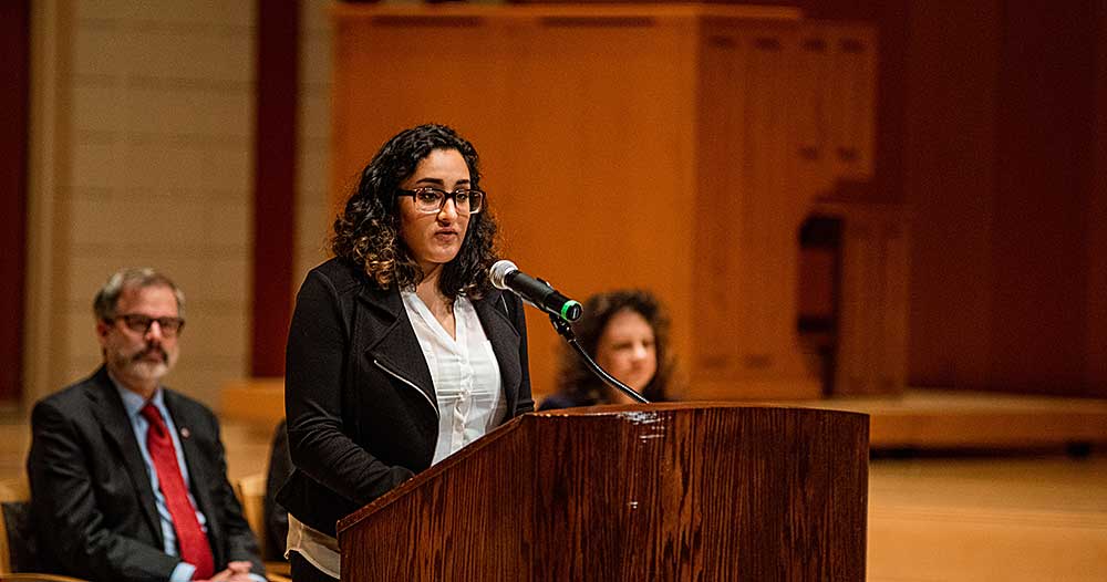 Amarit Ubhi, ASWU president, speaks at the American Studies Program closing ceremony.