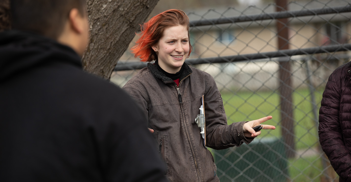 Student volunteer at community garden