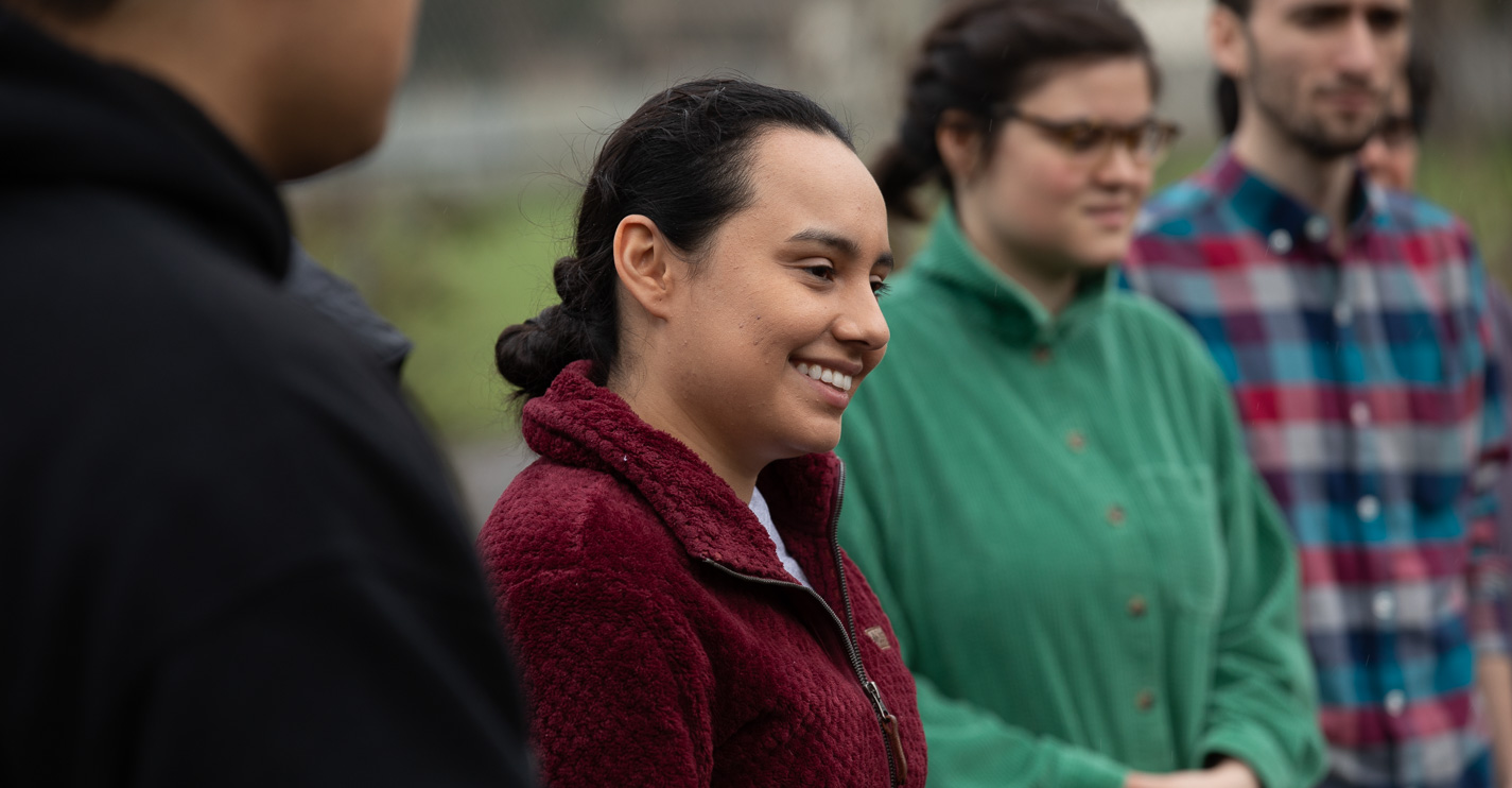 Student volunteer at community garden