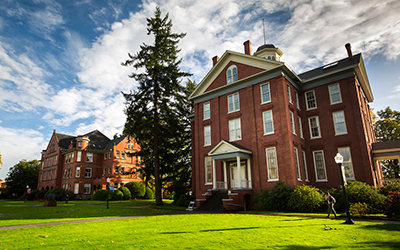 Waller Hall and Eaton Hall before a green lawn