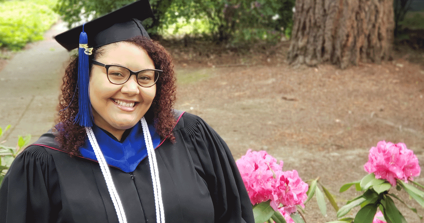 Melissa Joe in graduation regalia