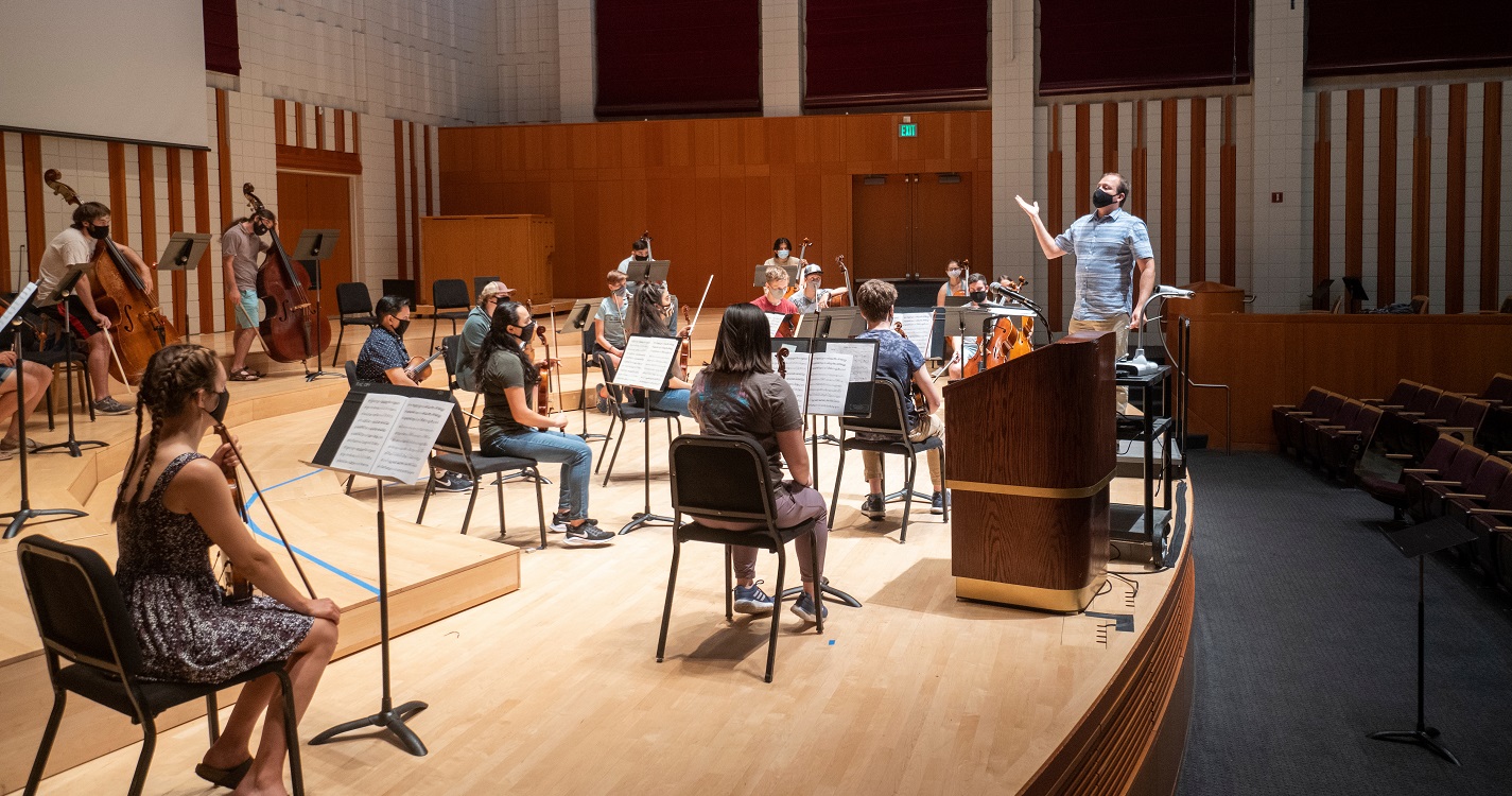 Student musicians practicing with facemasks on