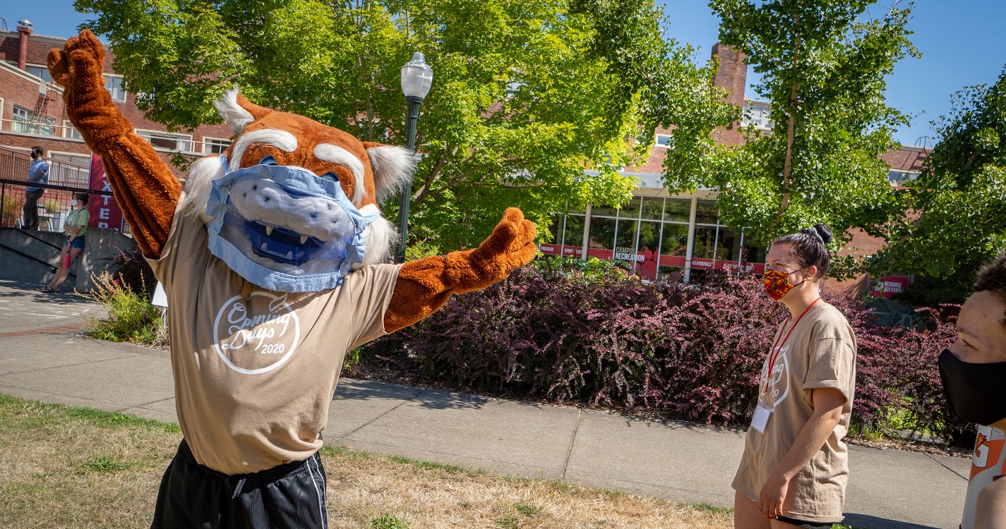 Blitz and students celebrating Opening Days with masks on