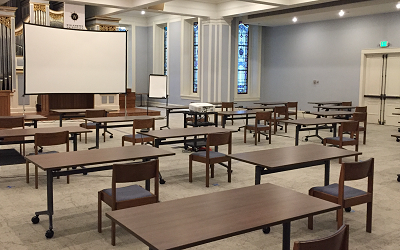 Cone Chapel post-renovation with carpet and tables in place of pews