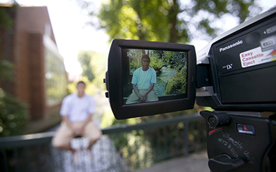 student filming 