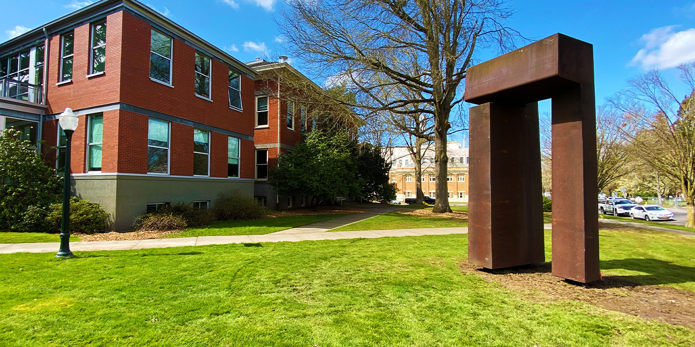 The 15-foot tall sculpture with Art Building in background