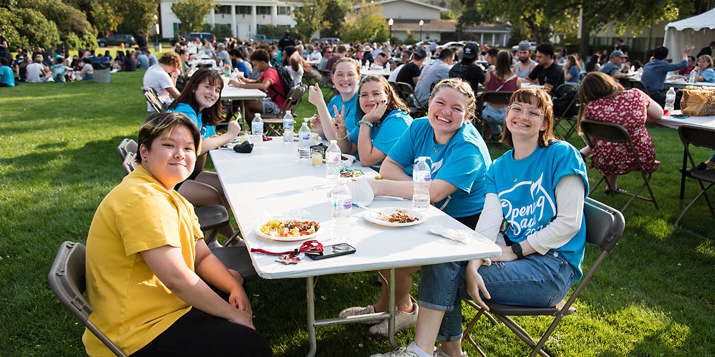 A group of student leaders enjoying dinner.