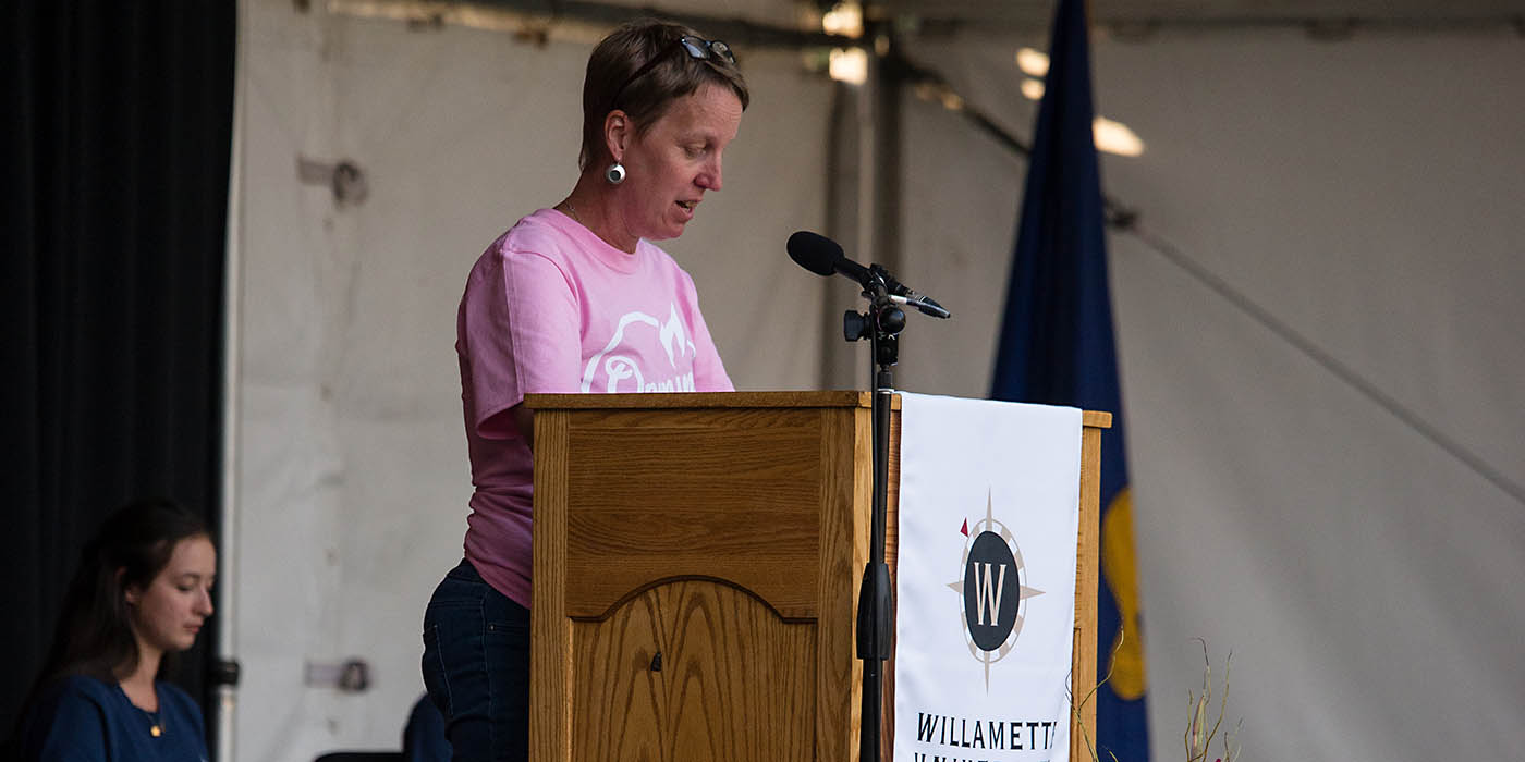 Professor Slochum sharing about Colloquium at the kick-off ceremony.