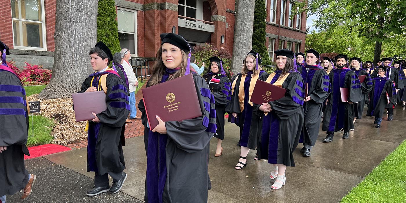 law grads walking