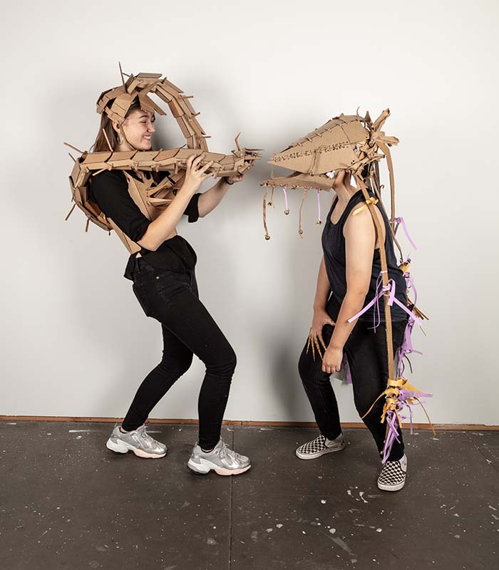 Students modeling cardboard