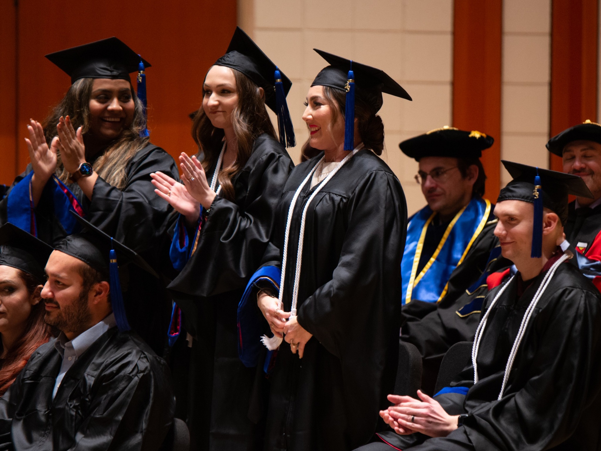 students clapping