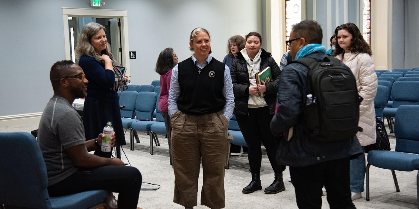 Terry talking to faculty and staff 