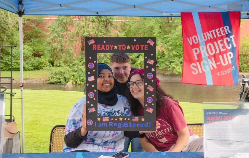 Students at a voter engagement table