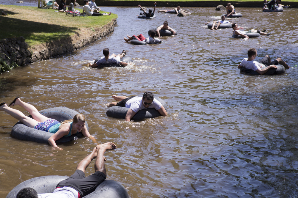 Students floating in the stream