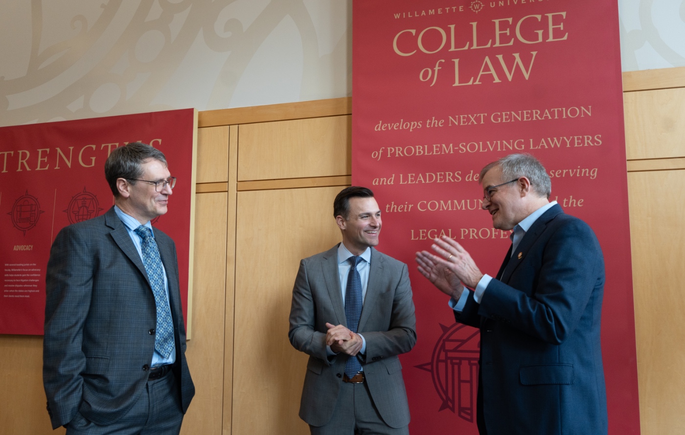 Rayfield, Thorsett, and Dobbins in the College of Law library