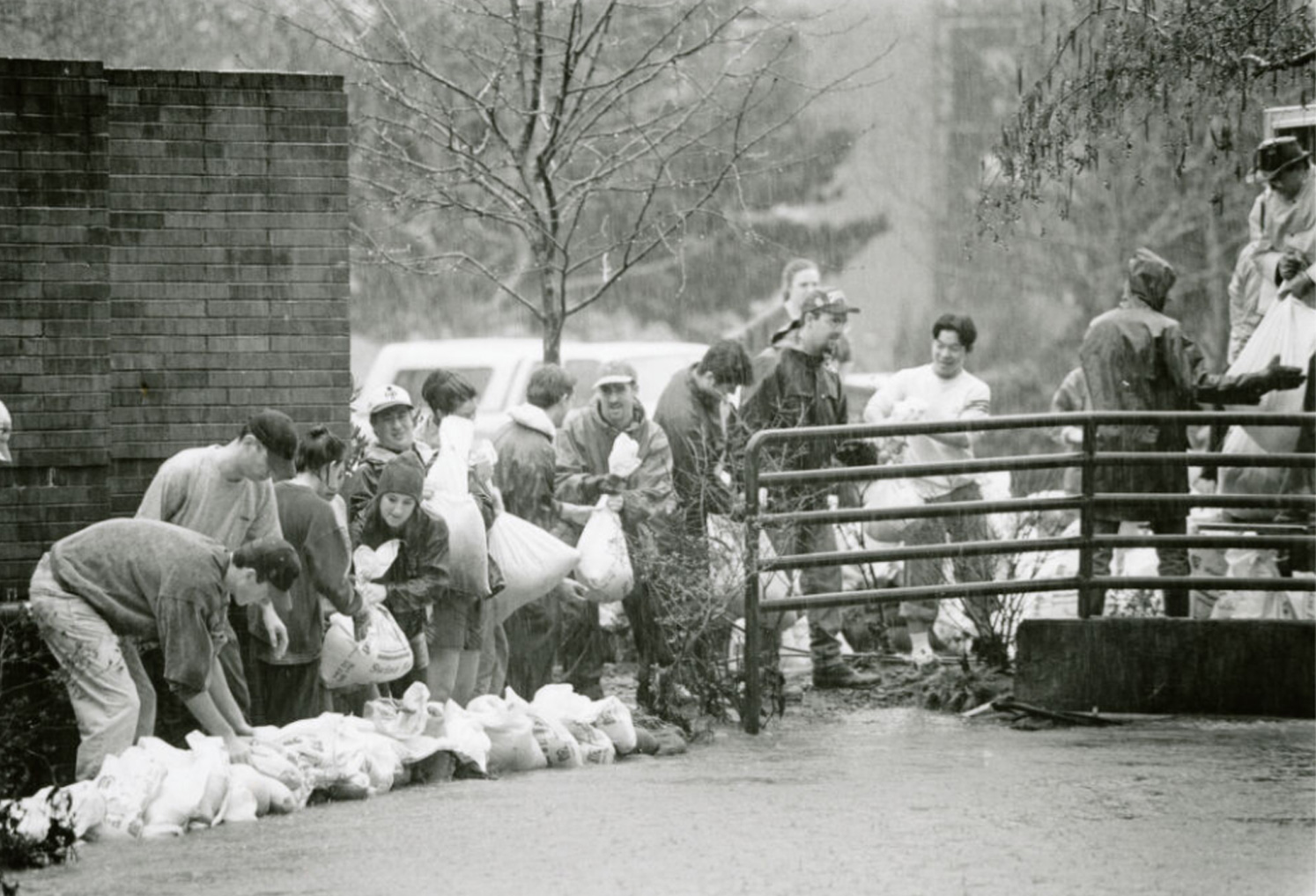 Willamette students adding a sandbag barrier.
