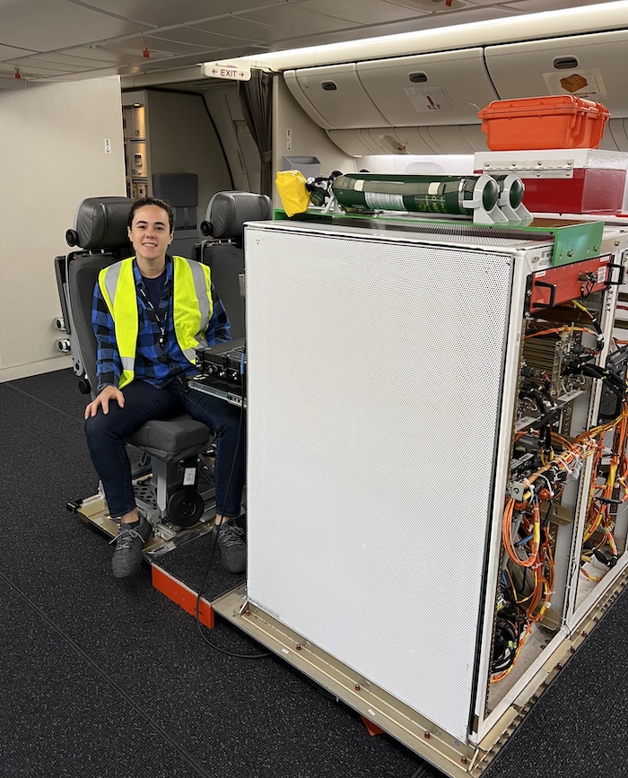 Sophie Clarke with an airplane component