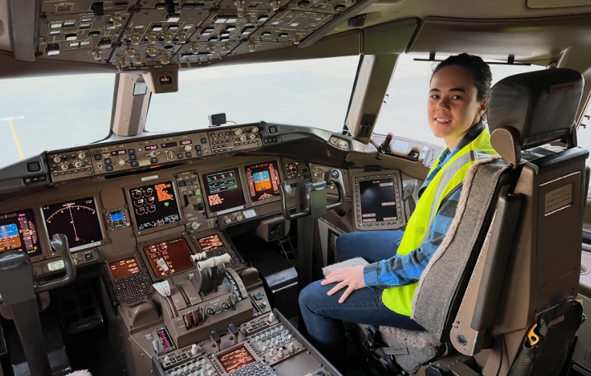 Sophie Clarke in an airplane cockpit