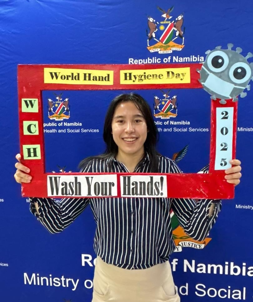 Emma Burtin with a world hand hygiene day sign