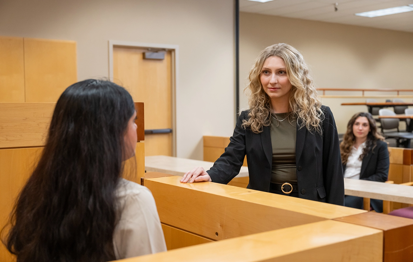 Student standing at the witness bench