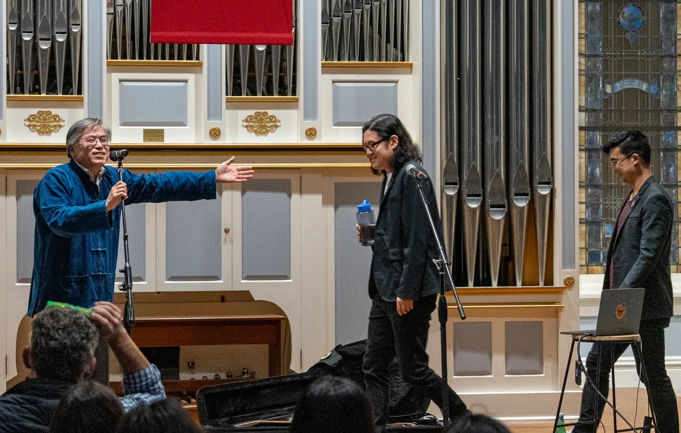 Juwen Zhang introducing The Slants