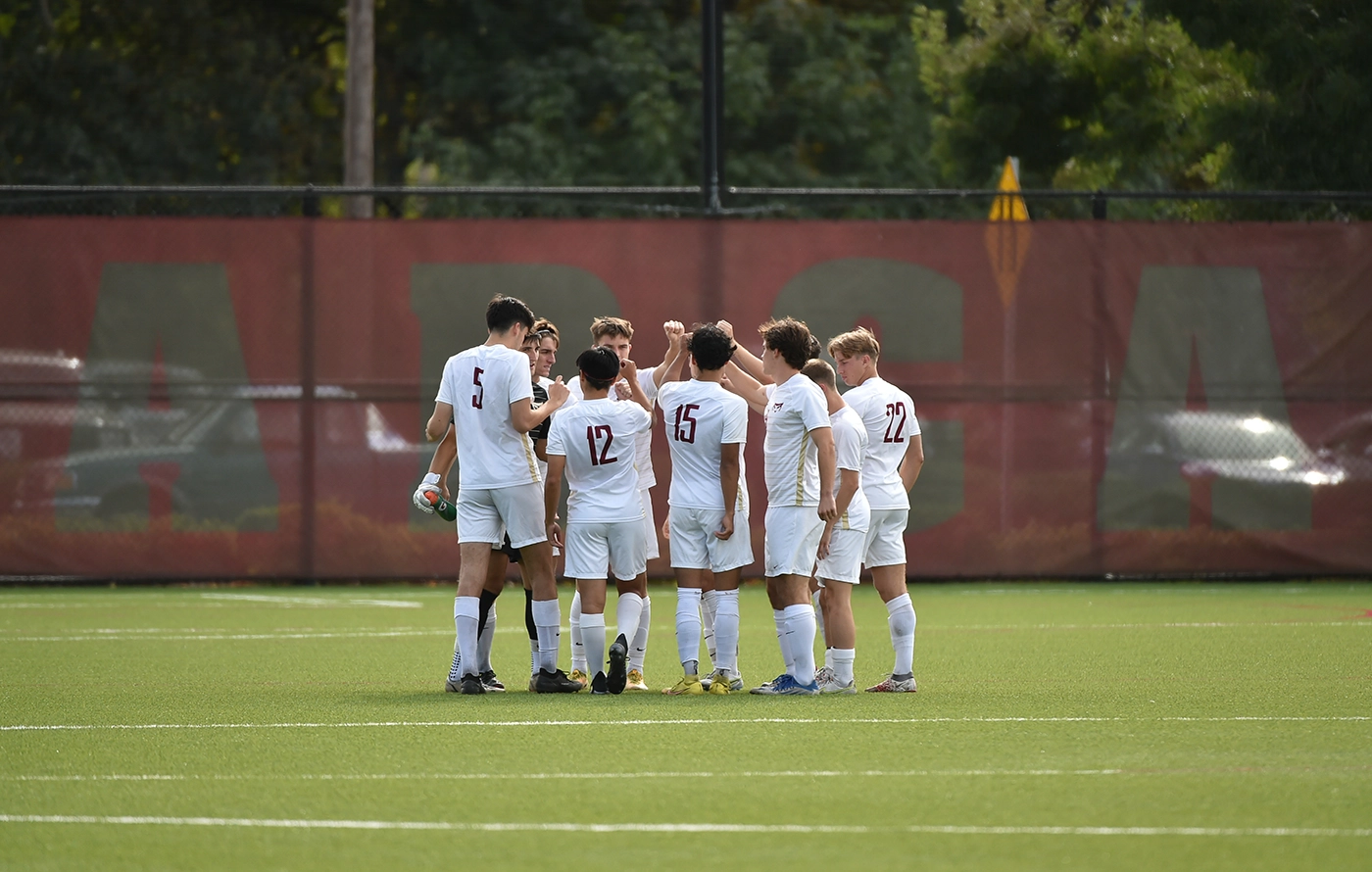 Soccer team in a huddle 