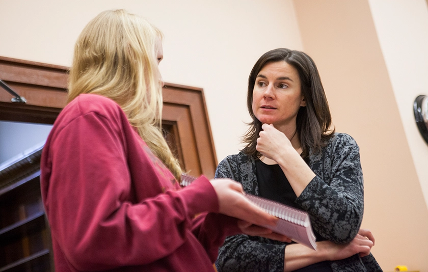 Student talking to a professor