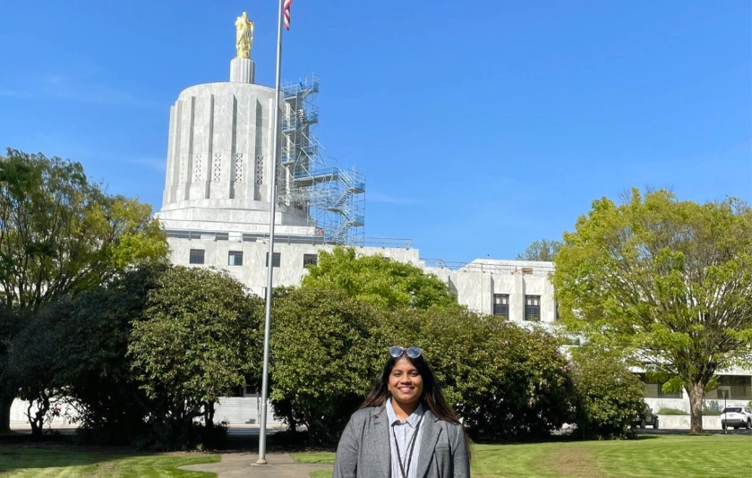 Dulasi Tenakoon in front of the Oregon Capitol