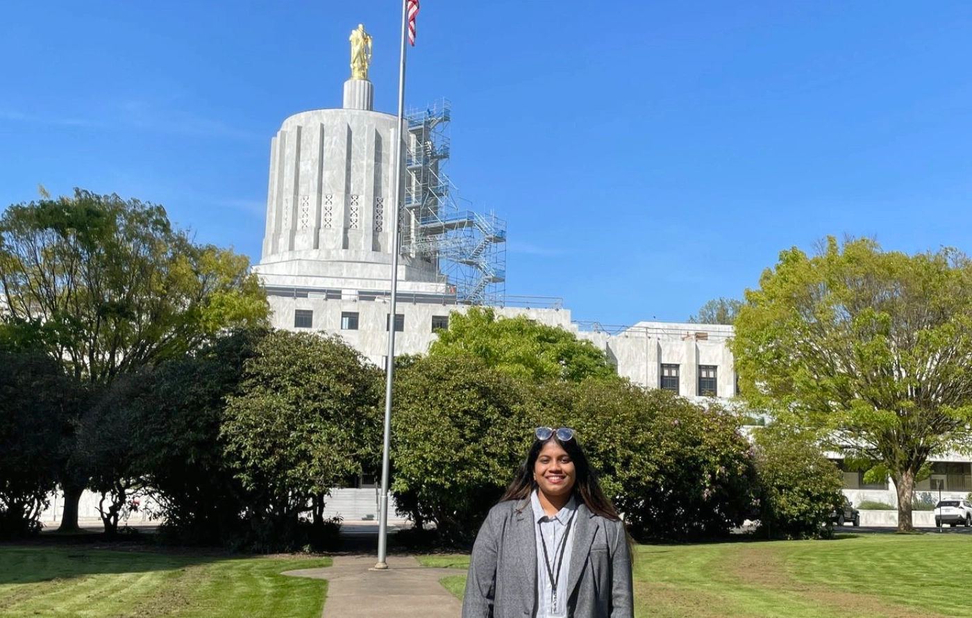 Dulasi Tenakoon in front of the Oregon Capitol