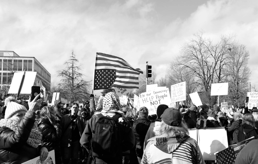 A black and white photo of protesters