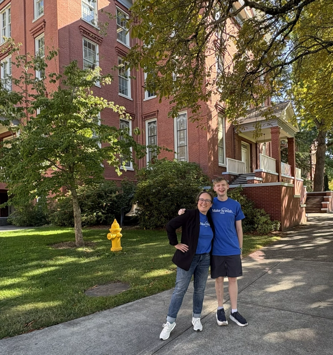 Mac and Laila in front of Waller Hall